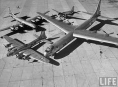 an old black and white photo of airplanes on the tarmac