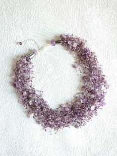 Amethyst necklace, Violet thick necklace, Crocheted necklace, Airy beaded necklace, Statement multistrand necklace, Violet bridal necklace Purple airy crocheted necklace with amethyst chips and glass seed beads. A bright, beautiful and flexible piece of jewelry, it will be a great addition to an evening or a wedding gown. It might be a perfect gift for her for a birthday, anniversary or another occasion. Measure: length (flexible): 48 cm (19 inches) + 4 cm chain (1,57 inches). Please remember th Purple Beaded Choker Jewelry, Bohemian Multi-strand Wedding Necklaces, Bohemian Multi-strand Necklace For Wedding, Bohemian Multi-strand Necklaces For Wedding, Handmade Multi-strand Necklaces For Wedding, Lavender Faceted Beads Necklace For Gifts, Lavender Necklace With Faceted Beads Gift, Wedding Necklaces With Amethyst And Natural Stones, Wedding Necklace With Round Natural Stones