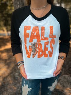 Unisex Bella Polyester and ringspun cotton Contrast raglan sleeves and collar Side seams Tear away label Black T-shirt For Fall Game Day, Black T-shirt For Game Day In Fall, Fall Letter Print Raglan Sleeve Top, White Raglan Sleeve T-shirt For Fall, Black Raglan Sleeve T-shirt For Fall, White T-shirt With Lettering For Fall, White Raglan Sleeve Top For Fall, Soft-washed T-shirt For College In Fall, Fall Graphic Tee Tops For College