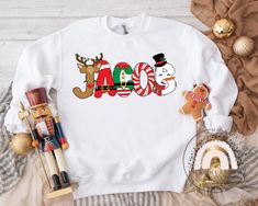 Personalized Christmas Name Sweatshirt, Kids Christmas Name Sweater, Kids Christmas Monogram Sweatshirt, Kids Toddler Christmas Sweatshirt Design is printed directly onto the shirt using Direct To Garment printer. The design is soft to touch. Shirts use to print are Premium quality brand. See picture for measurements & details. Kids Unisex Sweatshirt -8oz., 50% cotton, 50% polyester -1x1 ribbed collar, cuffs and waistband with spandex -Double needle stitching throughout -Pill-resistant air jet y Name Sweater, Name Sweatshirt, Monogram Sweatshirt, Birthday Gifts For Boyfriend Diy, Christmas Names, Sister Christmas, Christmas T Shirt Design, Christmas Monogram, Boyfriend Diy