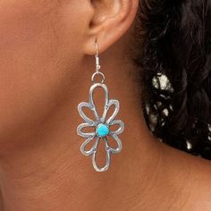 Chaco Canyon Sterling Silver Sleeping Beauty Turquoise Flower Earrings Add a fun, fashionable touch to any ensemble with these whimsical "flower" earrings. Handcrafted by Native American artisans, the sterling silver, flower-shaped drops are embellished with Sleeping Beauty turquoise, decorative textures and an oxidized finish.       Approx. 2-15/16"L x 1-1/8"W     Stamped .925     Pierced with wire backs     Earrings have open, flower-shaped drops with single, round blue turquoise in center     Textured accents     Oxidized, polished finish   Stone Information       All sizes and weights approximate     Stabilized Sleeping Beauty Turquoise - Round (8mm); mined in USA Blue Sterling Silver Flower Earrings For Pierced Ears, Bohemian Sterling Silver Flower Earrings, Teardrop Earrings With Flower Charm, Turquoise Dangle Earrings With Flower Charm, Elegant Turquoise Flower Earrings Nickel Free, Elegant Turquoise Nickel-free Flower Earrings, Turquoise Earrings With Flower Charm As Gift, Nickel-free Turquoise Drop Flower Earrings, Blue Sterling Silver Earrings With Flower Charm