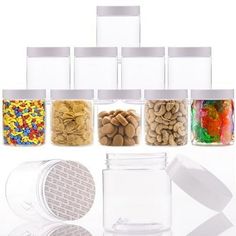 the jars are filled with different types of candy