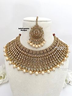 Antique Polki Necklace Set comes with earrings and tikka / Bridal necklace Set/ Reverse AD necklace Set/High Quality Kundan and Polki Jewelry/Wedding Jewelry/Antique dull gold necklace set All items are shipped from Brampton, Ontario, Canada. If you need your item by a certain day, please reach out to us for express delivery option before placing the order so that we can update the shipping for you. Standard shipping/delivery timeline Below are the delivery timeline estimates after the order is dispatched. ---> USA delivery timeline * 4-8 business days to major urban centers in USA. It may take 2-3 days extra to remote locations ---> Canada delivery timeline  * 2-3 business days - GTA  & Montreal  * 2-4  business days - Rest of Ontario/Quebec * 4-8 business days-  Rest of Canada    ---> Eu Bollywood Style Jewelry Sets For Reception, Bollywood Jewelry Sets For Diwali Reception, Bollywood Chandbali Jewelry Sets For Reception, Heavy Bollywood Tikka For Celebrations, Bollywood Heavy Jewelry Sets For Diwali, Heavy Bollywood Jewelry Sets For Diwali, Heavy Bollywood Bridal Necklace For Celebrations, Bollywood Style Heavy Bridal Necklace For Celebrations, Bollywood Style Heavy Tikka For Reception