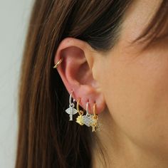 Make your ears the talk of the town with our Earring Charm! Change up your vibe with your charms – mix and match or stack 'em up! Our charms are perfect for pairing with our Tiny Hoops to give you the cutest touch. Get creative and show off your style! Trendy Small Hoop Earrings With Dangling Charms, Adjustable Moon Charm Earrings, Moon Charm Huggie Earrings, Trendy Small Hoop Earrings With Charms, Small Hoop Huggie Earrings With Charms, Cute Silver Hoop Earrings, Hoop Charms, نظارات شمسية, Talk Of The Town