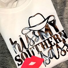 Kiss My Southern Sass Sassy Lips Kiss Cowgirl Cowboy Unisex Or Womens Fitted And White Or Black Shirt! Thanks So Much, More Styles, Colors & More Available Upon Request! 1/$19 Or 2/$24 Add To Bundle For Special Price! Freebies With Every Purchase :) Message Me Style #! Oe #2 Cowboy Shirts Women, Cowgirl Tshirt, Boss Tshirt, Fall Winter Fashion Trends, Zombie T Shirt, Advertising Gifts, Cowgirl Cowboy, Cowboys Shirt, Kiss My