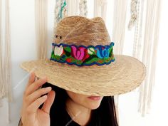 I love Mexico celebrates the native crafts of Mexico and the artists that produce them, enabling them and their communities to get recognized for their talented work and achieve economic stability for their families. This listing is for one piece of this beautiful handmade multi colored hat bands. They are prefect to add to your closet for your favorite dress, hat or even a shoulder bag as a lovely strap in multi colors. When purchasing please select the style you like referring to the picture w Adjustable Straw Hat For Beach And Cinco De Mayo, Artisan Hat Bands For Summer Festivals, Traditional Handmade Wide Brim Fedora, Artisan Handwoven Adjustable Fedora, Adjustable Hats For Cinco De Mayo Vacation, Adjustable Western Hat For Cinco De Mayo, Handmade Traditional Fedora For Beach, Traditional Handmade Fedora For Beach, Artisan Multicolor Hat Bands For Summer