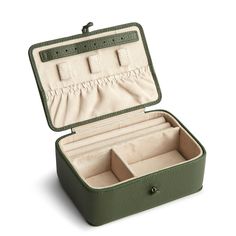 an open green suitcase on a white background