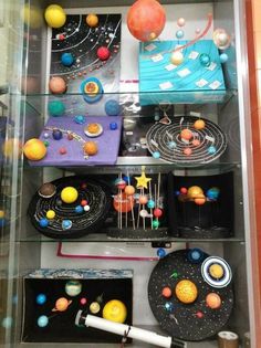 a display case filled with space related items