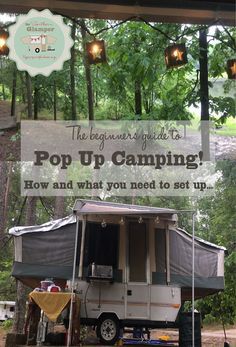 a camper trailer with the words pop up camping on it