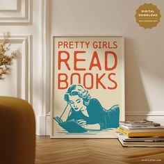 there is a poster on the wall that says pretty girls read books and sits next to some books