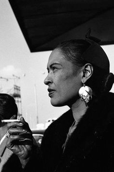 Billie Holiday at the d’Orly airport, Paris, photographed by Jean-Pierre Leloir, 1958.