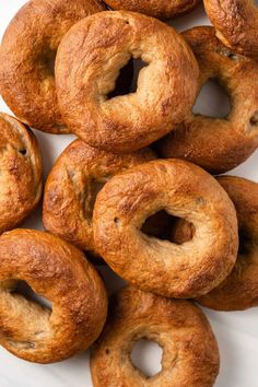 a pile of doughnuts sitting on top of each other