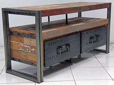 an industrial style coffee table with two drawers