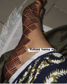 a person with henna on their foot and the words rukes hema ng