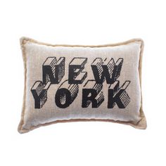 a pillow with the words new york printed in black and white on it's side