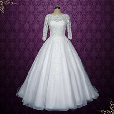 Elegant Lace Ball Gown Wedding Dress with 3/4 Sleeves | LUTHERA Fitted White Ball Gown With Lace Sleeves, White Lace Ball Gown With Lace Bodice, White Wedding Ball Gown With Lace Trim, White Lace Trim Wedding Ball Gown, White Lace-trimmed Ball Gown For Wedding, Lace Ball Gown Wedding Dress, Romantic Wedding Dress Lace, Wedding Dresses Lace Ballgown, Fairytale Princess