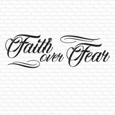 the word faith over fear written in black ink