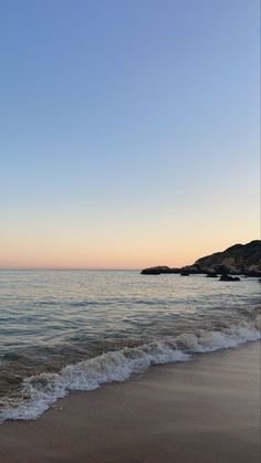 the beach is clean and ready to be used for swimming or playing in the water