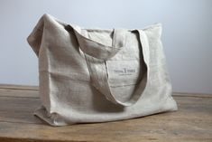 "Canvas Tote Bag with Zipper, Canvas Large Shoulder Bag in Natural Color, Linen Tote With Zipper, Natural Linen Tote Bag, Zipper Canvas Bag Light and roomy linen tote bag with zipper, crafted from softest prewashed linen, you can use it as shopper bag, summer beach bag or everyday bag. On the foto there is linen in natural color- outside, inside is white Tyvek. The bag's handles are very comfortable. The linen bag allows you to complement your styling or becomes its main point, no matter where y Tote Bag With Zipper, Linen Tote Bag, Burlap Tote Bags, Burlap Tote, Studio Bag, Fabric Tote Bags, Fabric Tote, Bag With Zipper, Large Shoulder Bags