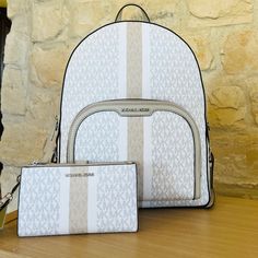 Guaranteed Authentic Brand New With Tags Attached Bundled 2pcs Set Handbag&Wallet Classic White Wallet For Travel, Classic White Wallet With Removable Pouch, Designer White Travel Wallet, Luxury White Wallet For Travel, Elegant White Backpack With Removable Pouch, Luxury White Travel Wallet, Michael Kors White Backpack For Daily Use, Michael Kors White Everyday Wallet, Michael Kors White Rectangular Wallet