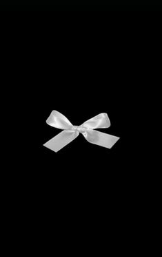 a white bow on a black background