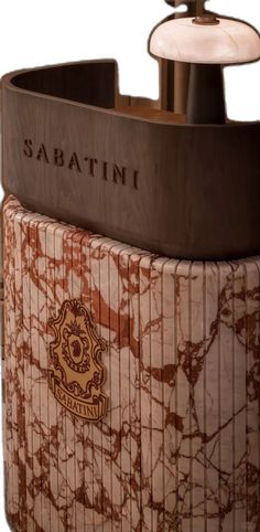 a soap dispenser with the name sabatini on it