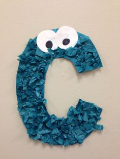 the letter c made out of toilet paper with googly eyes