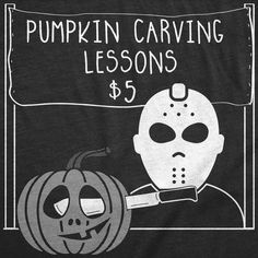 a black shirt with an image of a pumpkin and a jack - o'- lantern