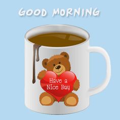 a cup of coffee with a teddy bear holding a heart and the words good morning have a nice day on it