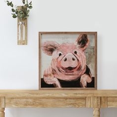 a painting of a pig sitting on top of a wooden table