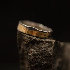 A simple oxidized silver band, straight on one side and raw and cracked on the other, with a thin gold leaf burnished on top of the silver, creates a stunning look of 24K gold popping up from the dark silver unrestrained, showing a different texture each time. * Material: Silver & Gold * All of our jewelry is handmade, so there might be a slight difference between each piece * If you can't find the information you need or have any special requests, please contact us. We are quick to reply :) ♡ F Keum Boo, Rough Texture, Different Textures, Oxidized Silver, Silver Band, Gold Leaf, Halloween Shopping, Wedding Rings Engagement, Wedding Engagement