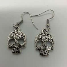 Day Of The Dead Skull Earrings Steel Stainless Small Gothic Skull Earrings For Halloween, Punk Skull Print Earrings For Gift, Bohemian Metal Earrings For Halloween, Punk Skull Print Earrings Gift, Punk Style Skull Print Earrings As Gift, Silver Earrings For Halloween Festival, Silver Skull Earrings For Halloween, Halloween Skull Print Earrings Gift, Gothic Skull Print Earrings For Gift