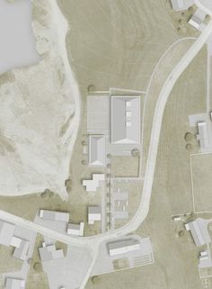 this is an aerial view of a building and its surrounding area, including the parking lot