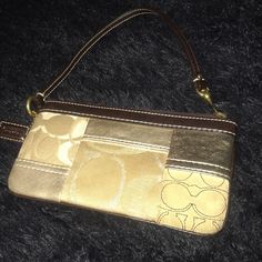 Beautiful Condition Coach Wristlet. I Got As A Present A Few Years Back But Never Used It Much. Would Love For Someone To Find It A New Home (: Gold Rectangular Coach Coin Purse, Gold Clutch Wristlet For Everyday Use, Gold Wristlet Clutch For Everyday Use, Coach Gold Wristlet For Everyday Use, Coach Gold Clutch Wristlet, Coach Gold Rectangular Wristlet, Gold Coach Wristlet For Everyday, Gold Coach Clutch Wristlet, Gold Rectangular Coach Wristlet