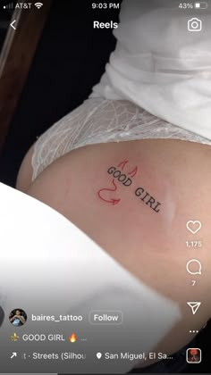 the back of a woman's stomach with words written on it and an arrow