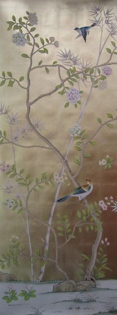 two birds sitting on top of a tree in front of flowers and trees with leaves