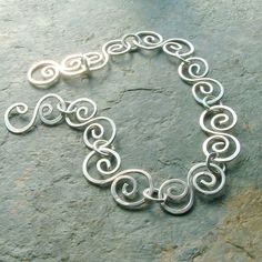 Silver Chain Bracelet Sterling Water Element Swirl Handmade | Etsy Swirl Bracelet, Hammered Jewelry, Wave Bracelet, Swirl Earrings, Water Element, Eco Friendly Jewelry, Handmade Wire Jewelry, Silver Chain Bracelet, Bracelet Sterling Silver