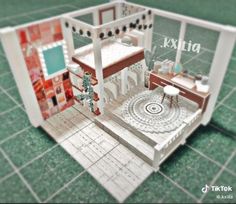 a small doll house with furniture and accessories