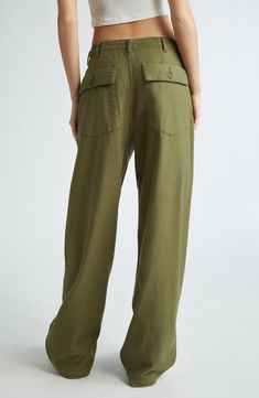 These utility pants are cut in a wide-leg silhouette from Japanese surplus military sateen that's slubbed and treated with an enzyme wash for softness. 32 1/2" inseam; 22" leg opening; 13 1/2" front rise; 17" back rise (size 29) Button fly Front slant pockets; back button-flap patch pockets 100% cotton Machine wash, dry flat Imported SPACE: A shop for emerging and advanced designers Casual Olive Wide Leg Pants With Pockets, Spring Military Wide Leg Cargo Pants, Spring Military Style Wide Leg Cargo Pants, Spring Military Wide-leg Cargo Pants, Military Wide Leg Cargo Bottoms, Military Style Wide Leg Cargo Bottoms, Military Cargo Style Wide Leg Bottoms, Utility Wide Leg Pants With Welt Pockets, Military Style Wide Leg Relaxed Bottoms