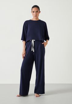 Looking for pyjamas that don't look like conventional pyjamas? Consider it done. Our Midy set takes inspiration from athleisure styles, with a contrasting drawcord to the waist for a slightly sportier feel. We've gone for dropped shoulders and an oversized fit up top, and the cotton slub fabric is so soft you'll never want to take them off. Athleisure Fashion, Women Nightwear, Pyjama Set, Pink Sweatshirt, Jumper Dress, Neck Pattern, Hush Hush, Nightwear, Festival Season