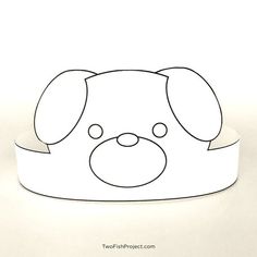 a paper cut out of a dog's head with a ribbon around its neck