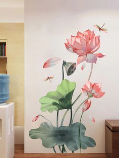 a room with a large flower mural on the wall and a dragon flying over it