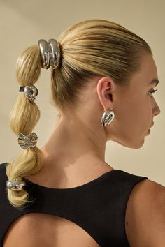 Upgrade your ponytail game with our Glossy Loop Ponytail Holder. Say goodbye to boring hair ties and hello to a sleek, stylish look. Hand casted out of clay, the glossy loop charm adds a fun yet modern touch to any hairstyle, making it a must-have accessory for your hair collection. Geometric Arch, Lelet Ny, Black Tie Optional, Easy Updo, Glam Boho, Halo Headband, Boring Hair, Headband Jewelry, Thicker Hair