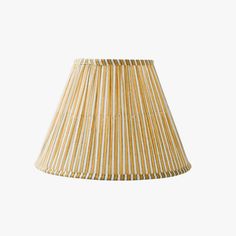 a lamp shade that is made out of wood and has stripes on the bottom of it