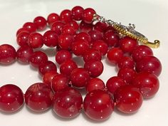 Vintage Round Natural Red Mediterranean Coral Sterling Silver 925 Bead Necklace....Marked 925...Total of weight 59.5grams...Measure of Necklace 22'' inches long. Measure of Red Corals 8.3MM to 11.3MM. It's in very good condition. Red Polished Beads Jewelry For Formal Occasions, Formal Red Jewelry With Polished Beads, Formal Red Polished Beaded Jewelry, Formal Red Coral Beaded Necklace, Red Round Beads Bracelets For Formal Occasion, Classic Red Gemstone Beads Necklace, Classic Red Necklace With Gemstone Beads, Red Necklaces With Sterling Silver Clasp And Round Beads, Classic Red Beaded Necklace As Gift