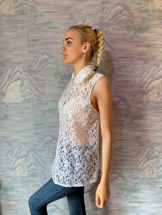 "Ivory White Lace Vintage blouse Sheer Lace Blouse Button Up Summer Blouse Floral Vintage Romantic Bohemian Medium to Large Size N.B. Color may slightly differ from picture. Estimated size: M/L Measurements (laying flat): Bust: 21,5\" / 54 cm Waist: 25\" / 64 cm Length: 28\" / 71 cm Please check measurements to insure a proper fit. Remember to allow yourself some extra room for movement. You can compare these with something from your closet that fits you well. Please convo me if you need additio Chic Lace Button-up Blouse, Spring Wedding Button-up Blouse, Chic Lace Top Button-up Blouse, Chic Button-up Lace Blouse, Chic Button-up Blouse With Lace Top, Feminine Summer Blouse With Delicate Lace, Summer Feminine Blouse With Delicate Lace, Feminine Lace Button-up Blouse, Chic Lace Button-up Tops