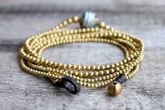 Triple Wraps Brass Ball Nepal Tibetan Bracelet/ Necklace Tibetan Bracelet, Triple Wrap Bracelet, Brass Bell, Brass Bells, Bracelet Necklace, Bead Weaving, Air Mail, Nepal, Wrap Bracelet