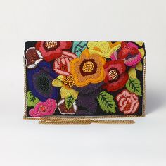 This exceptional accessory is a stunning addition to any evening out. The purse with its 3D detailed hand beading perfectly complements and dresses up any outfit, formal or casual. A bag such as this is perfect for going out with friends, attending a get-together, a wedding, a birthday party, or attending a music festival. It is also a wonderful gift to give friends and family members. Please let us know if you have questions? We will be happy to answer them and get back to you as soon as possib Black Beaded Pouch Clutch, Black Beaded Rectangular Clutch, Elegant Multicolor Clutch Wallet, Embellished Multicolor Evening Bag, Multicolor Beaded Pouch Evening Bag, Multicolor Clutch Evening Bag For Events, Gift Embellished Multicolor Shoulder Bag, Multicolor Beaded Rectangular Evening Bag, Multicolor Beaded Rectangular Pouch