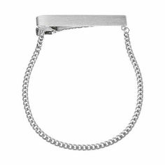 Polish off your 9-to-5 style with this brushed rhodium-plated tie bar, featuring a tie chain designed to clip easily and securely to the shirt.Neck tie is held in place by placing it inside the chain circleBar measures 2 x ¼ x ½"Chain measures 7 x ⅛ x 1/16"Plated base metalMetal Color: Silver ToneBase Material: 100% BrassCare: Spot Clean, Wipe CleanMetal: BrassCountry of Origin: Made in US Tie Chain, Circle Bar, Chain Silver, Tie Bar, Rhodium Plated, Jewellery And Watches, Neck Tie, Silver Chain, Cufflinks