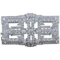 This expertly crafted handmade Art Deco Style piece, features 8.46 carats of sparkling European and single cut diamonds set in platinum with a fine expert milgrain around each diamond. The geometric shapes on this classic brooch are typical of Art Deco style pieces. Brooch Length: 2.30 inches Brooch Width: 1.35 inches Art Deco Diamond Jewelry, Art Deco Brooch, Diamond Brooch, 1920s Art Deco, 1930s Art Deco, Estilo Art Deco, Geometric Diamond, Art Deco Era, Art Deco Diamond